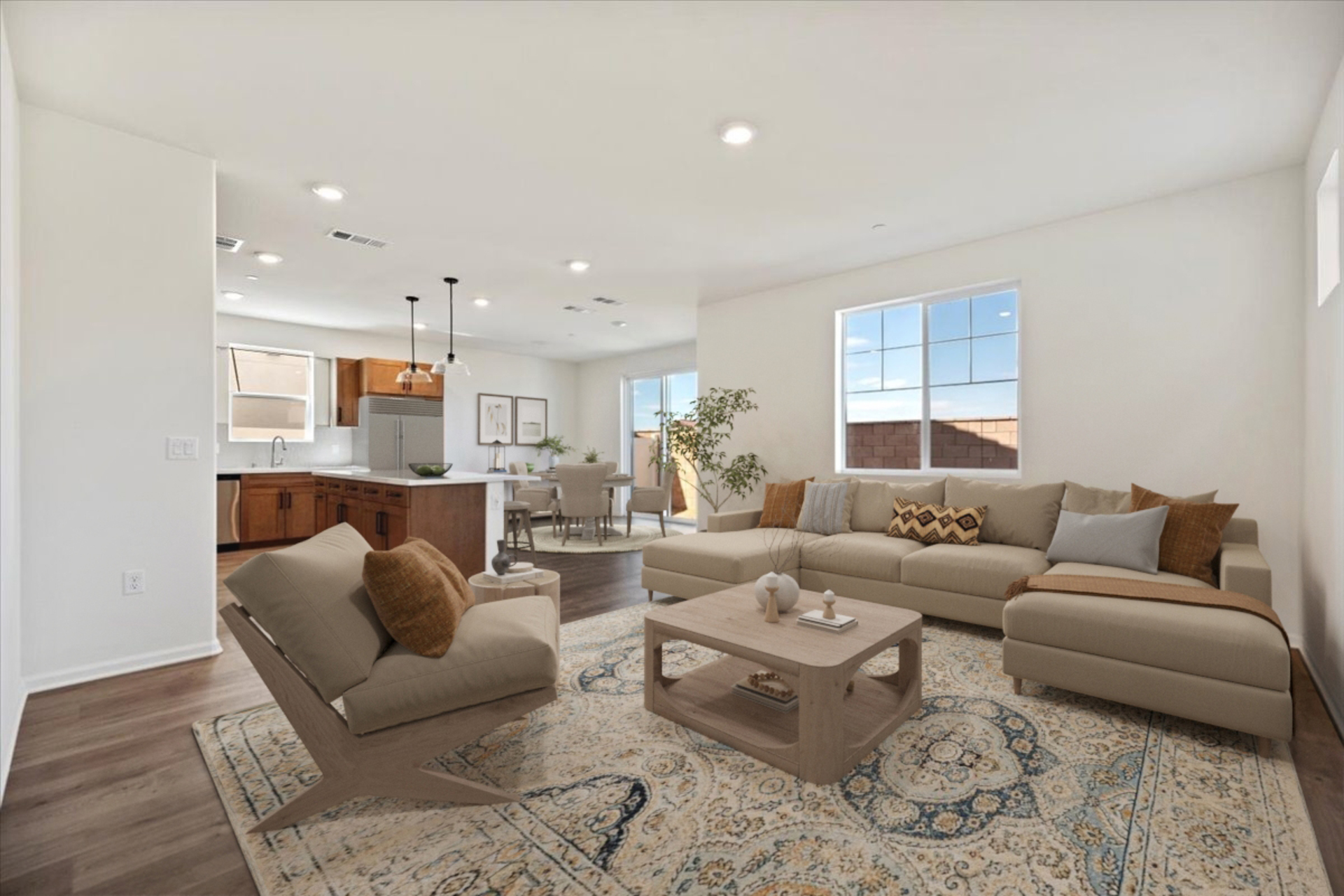 great room featuring a sectional and chair with a brown square coffee table