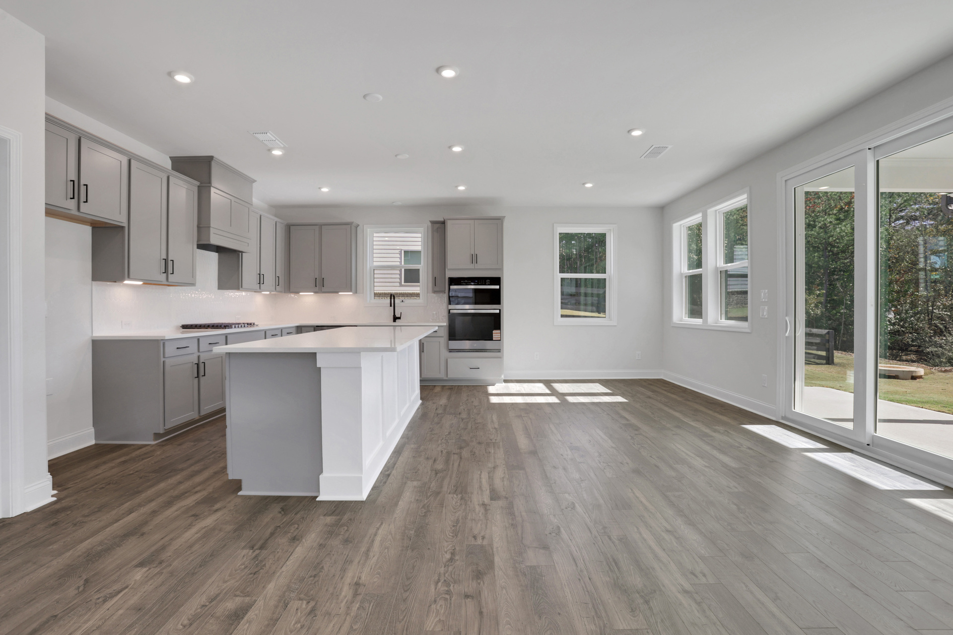 kitchen with large center island and gray cabinets