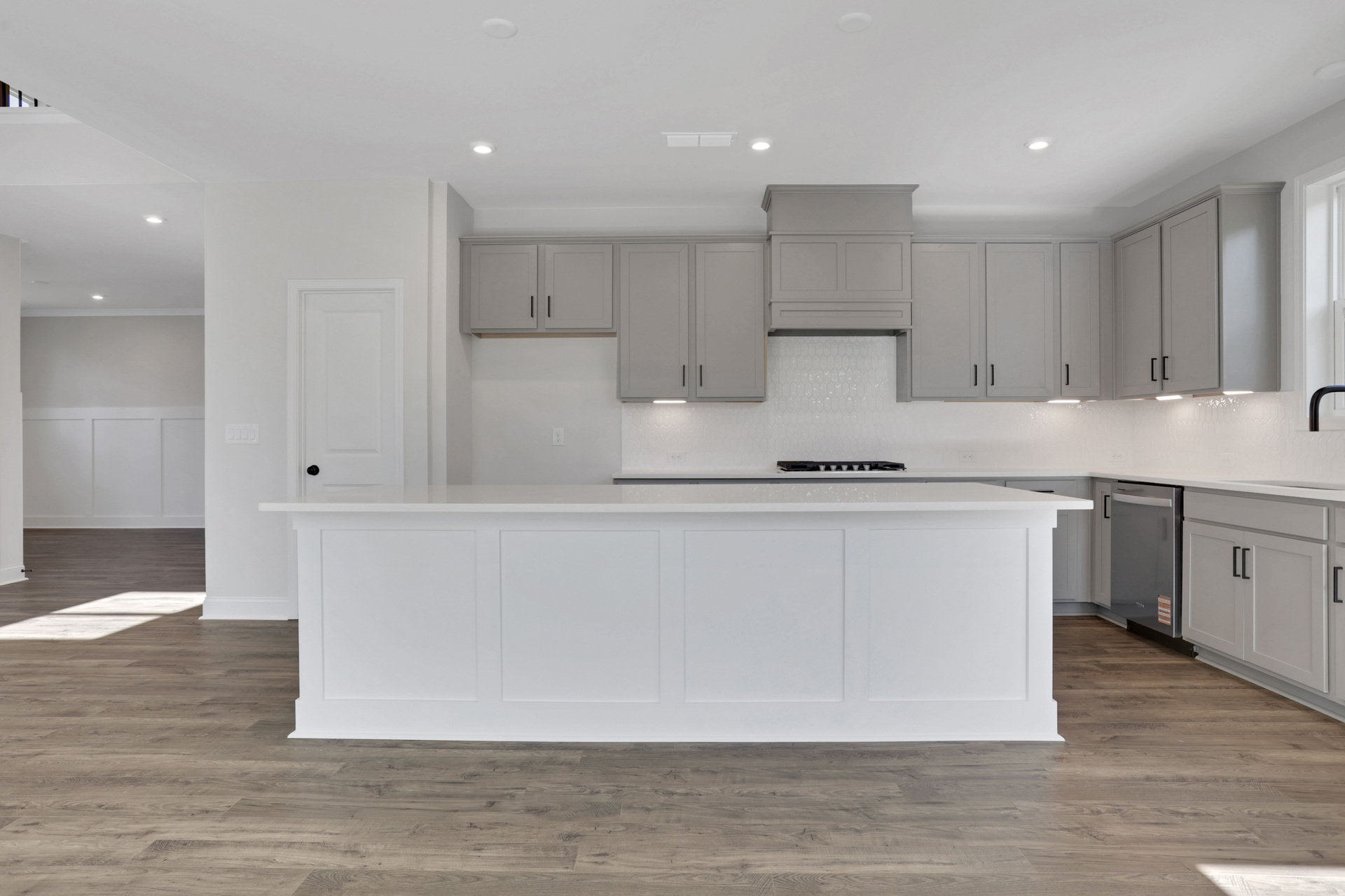 kitchen with large center island and gray cabinets