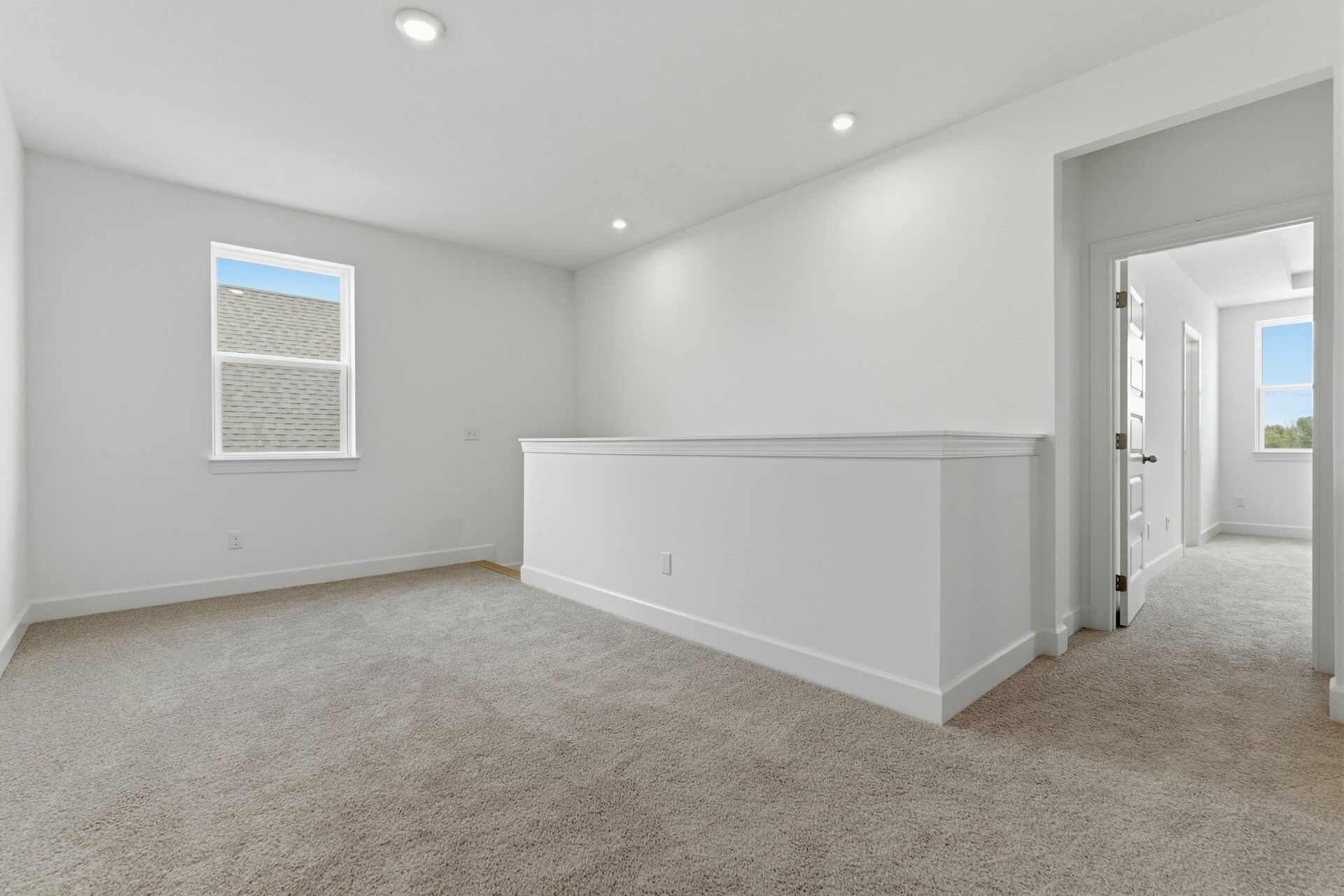 loft with light carpet