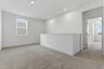 loft with light carpet