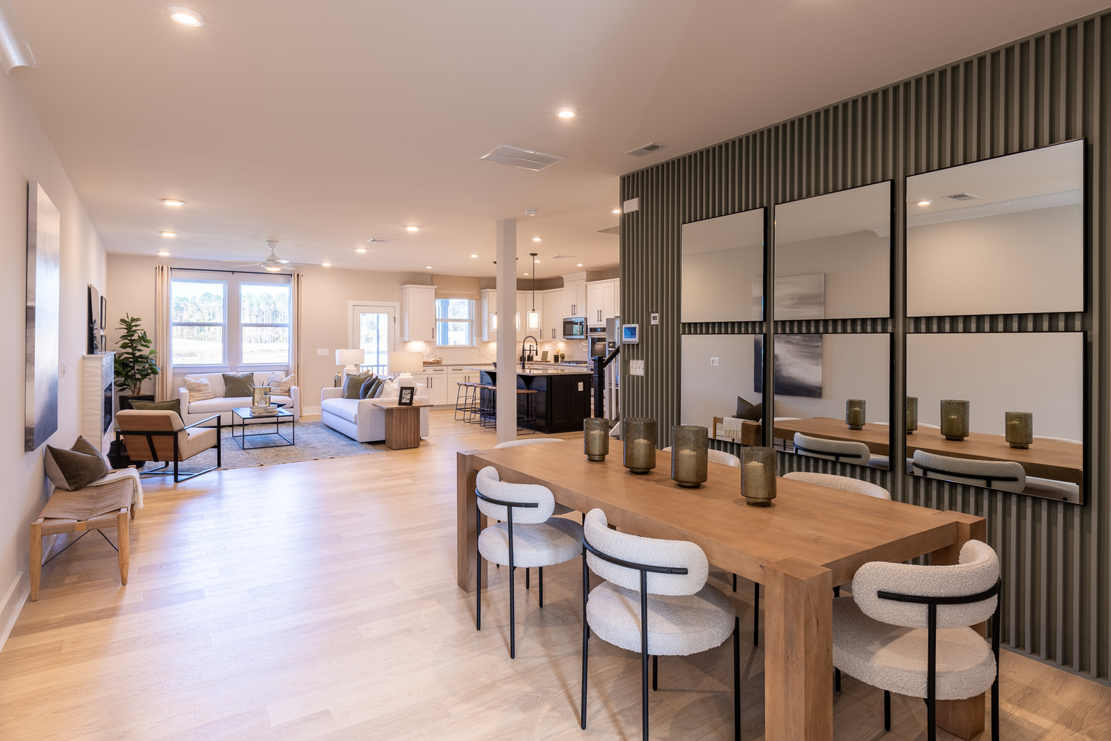 open dining area with a large table and chairs upon entry