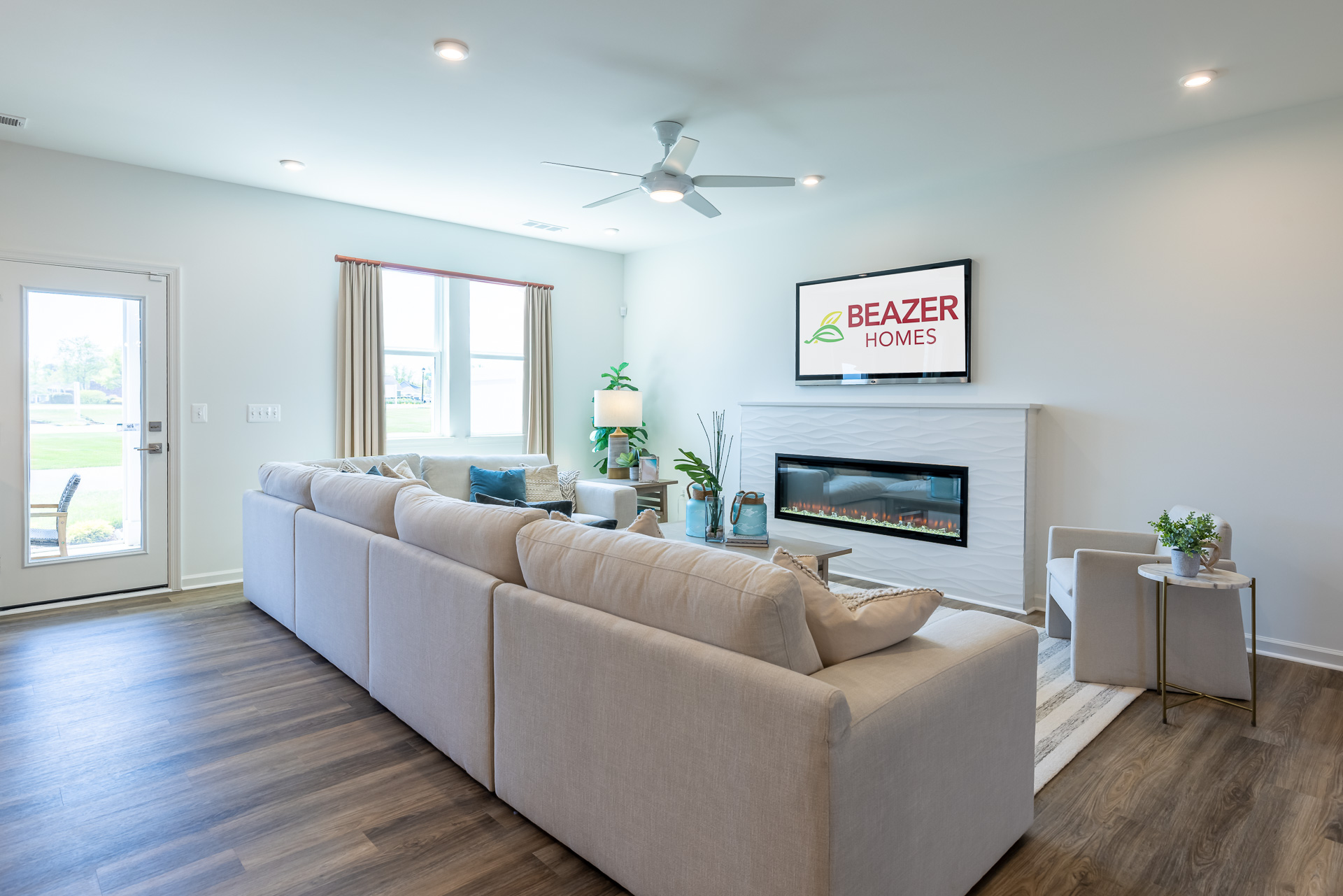 great room with an electric fireplace