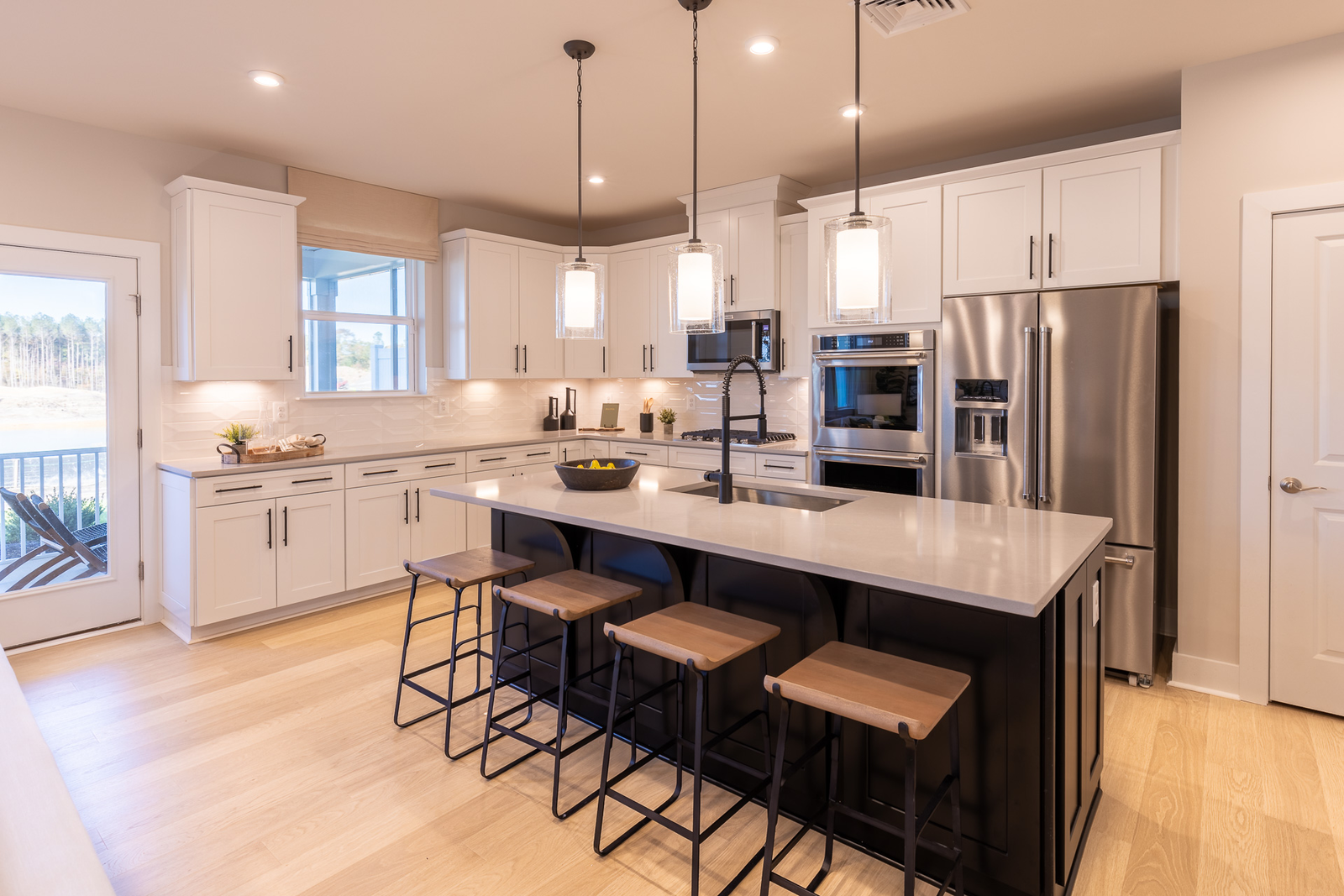 kitchen with white cabinets and a center island