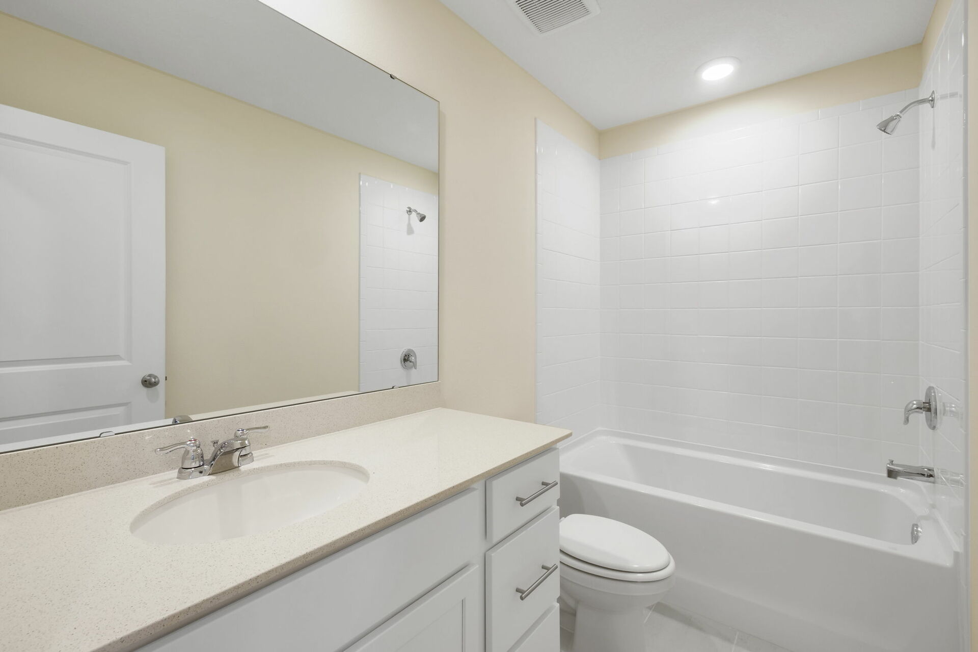 single sink vanity with mirror, water closet and tub