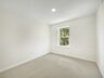 carpet throughout with single window and closet