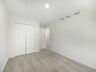 carpet throughout with single window and closet