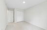 carpet throughout with single window and closet
