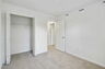carpet throughout with a closet and single window
