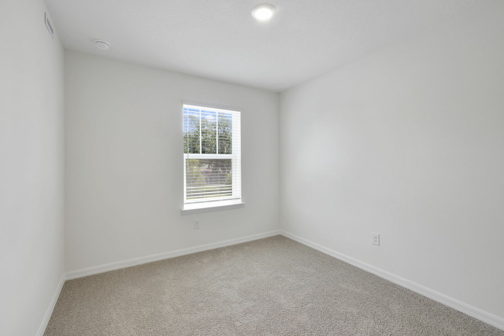 carpet throughout with a closet and single window