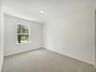 carpet throughout with single window and closet