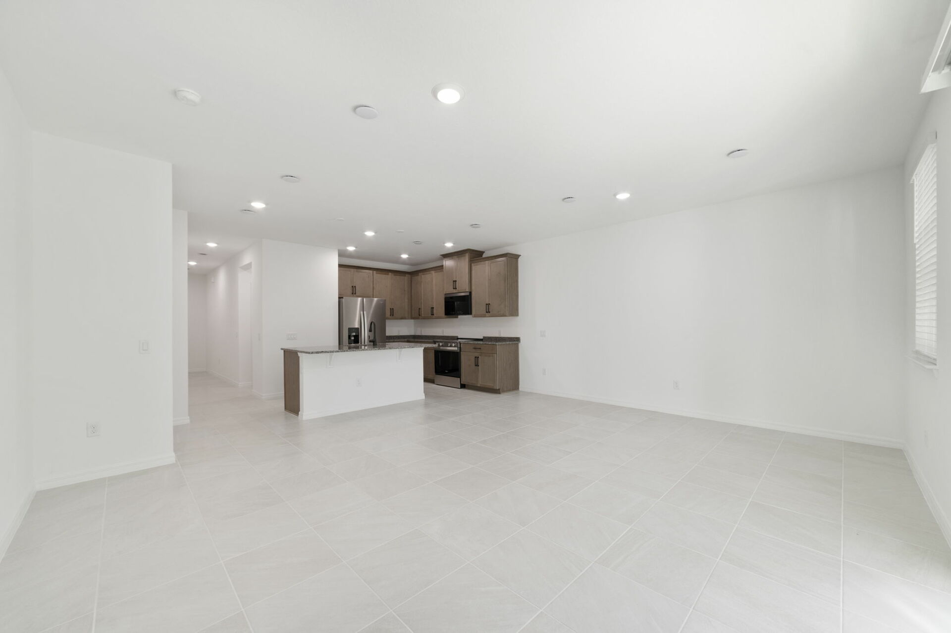 room with access of covered lanai and access to the kitchen