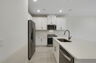 center island with stainless steel appliances