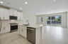 center island with stainless steel appliances