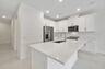 center island with stainless steel appliances