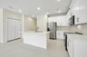 center island with stainless steel appliances