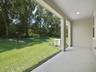 covered patio with view of the backyard