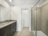 dual sink vanity, with shower and water closet
