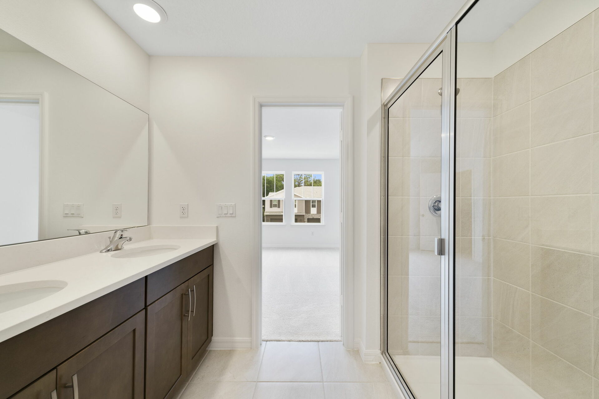 dual sink vanity and shower