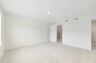 carpet throughout multiple windows and walk-in closet 