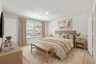 carpet throughout and multiple Lage windows