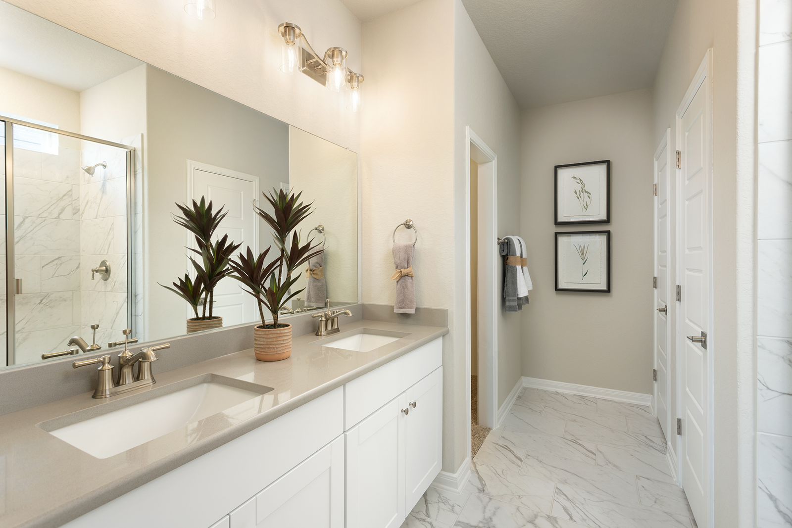 bathroom with white flooring & walk-in shower 