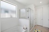 spacious bathroom with soaking tub and walk-in shower