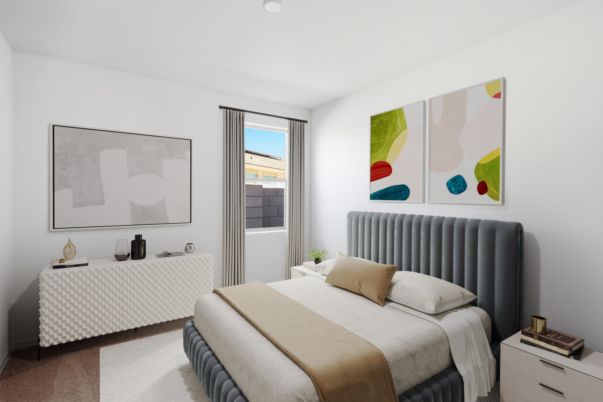 spacious room with a large neutral colored bed, a white dresser, and white nightstands