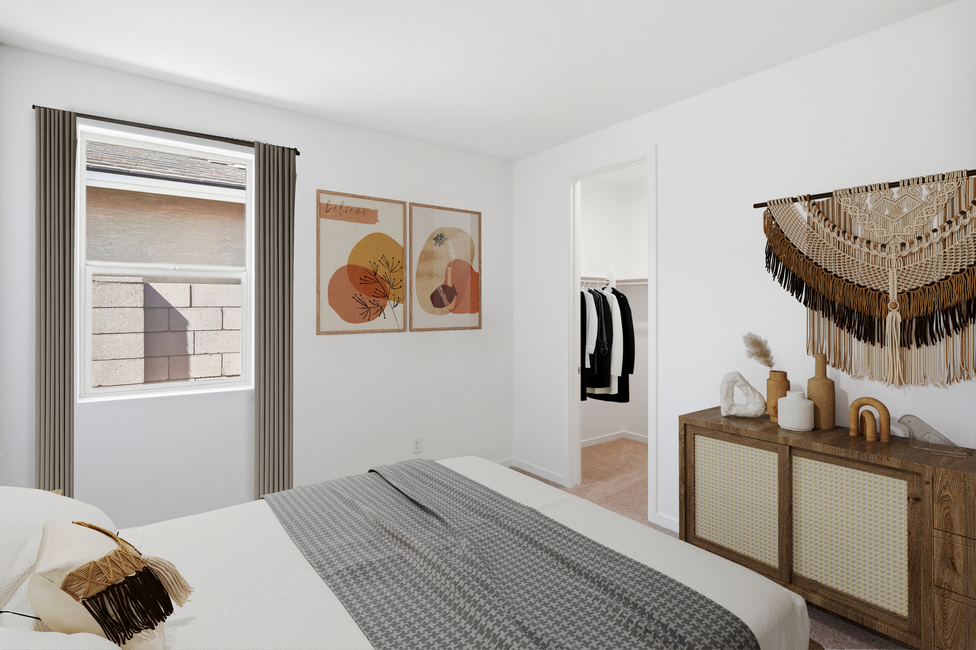 bedroom with a spacious bed with a grey duvet, a dark wooden dresser, and a western-themed aesthetic