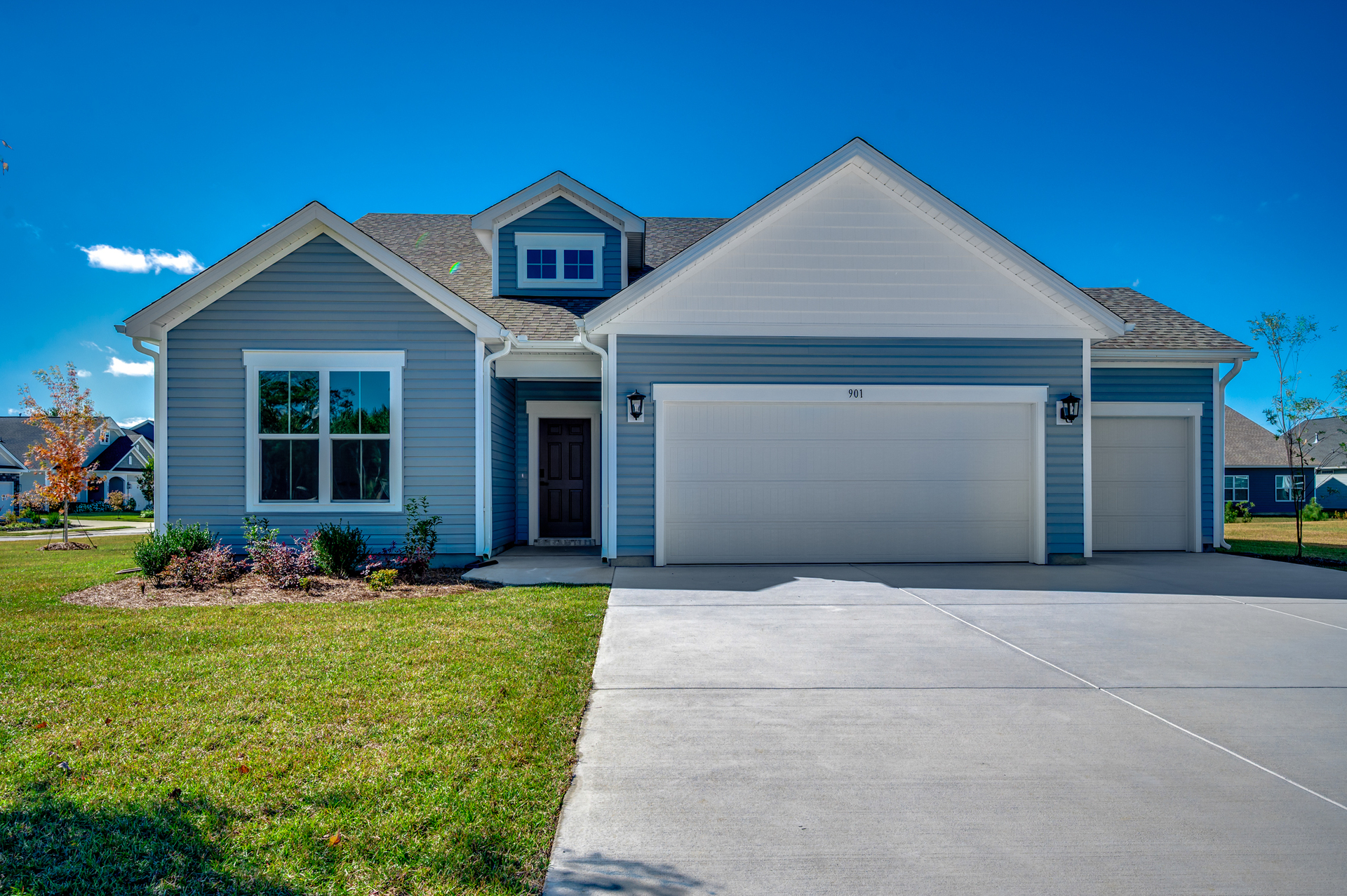 light blue vinyl siding with white trim