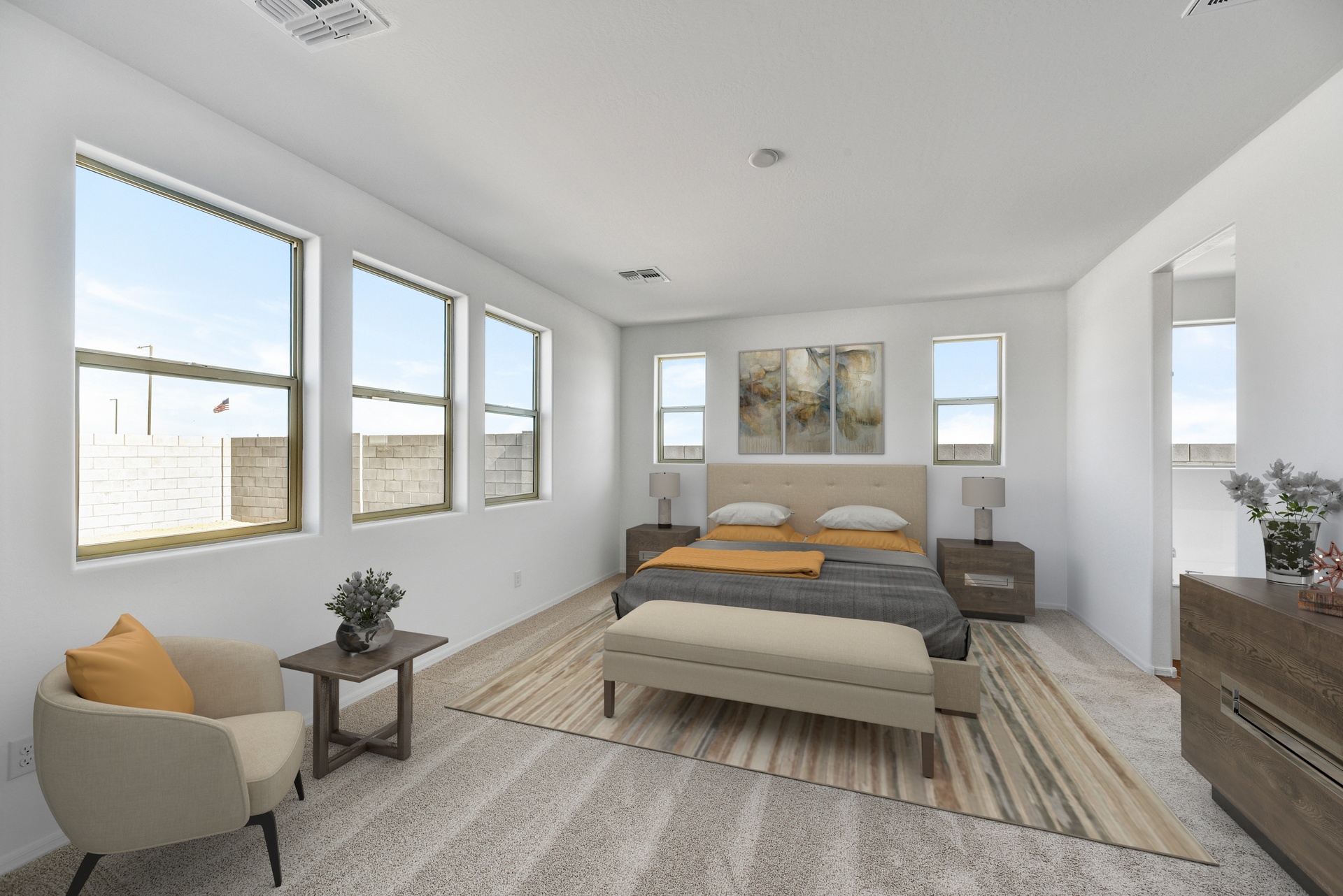 spacious bedroom with a large bed and dark wooden nightstands
