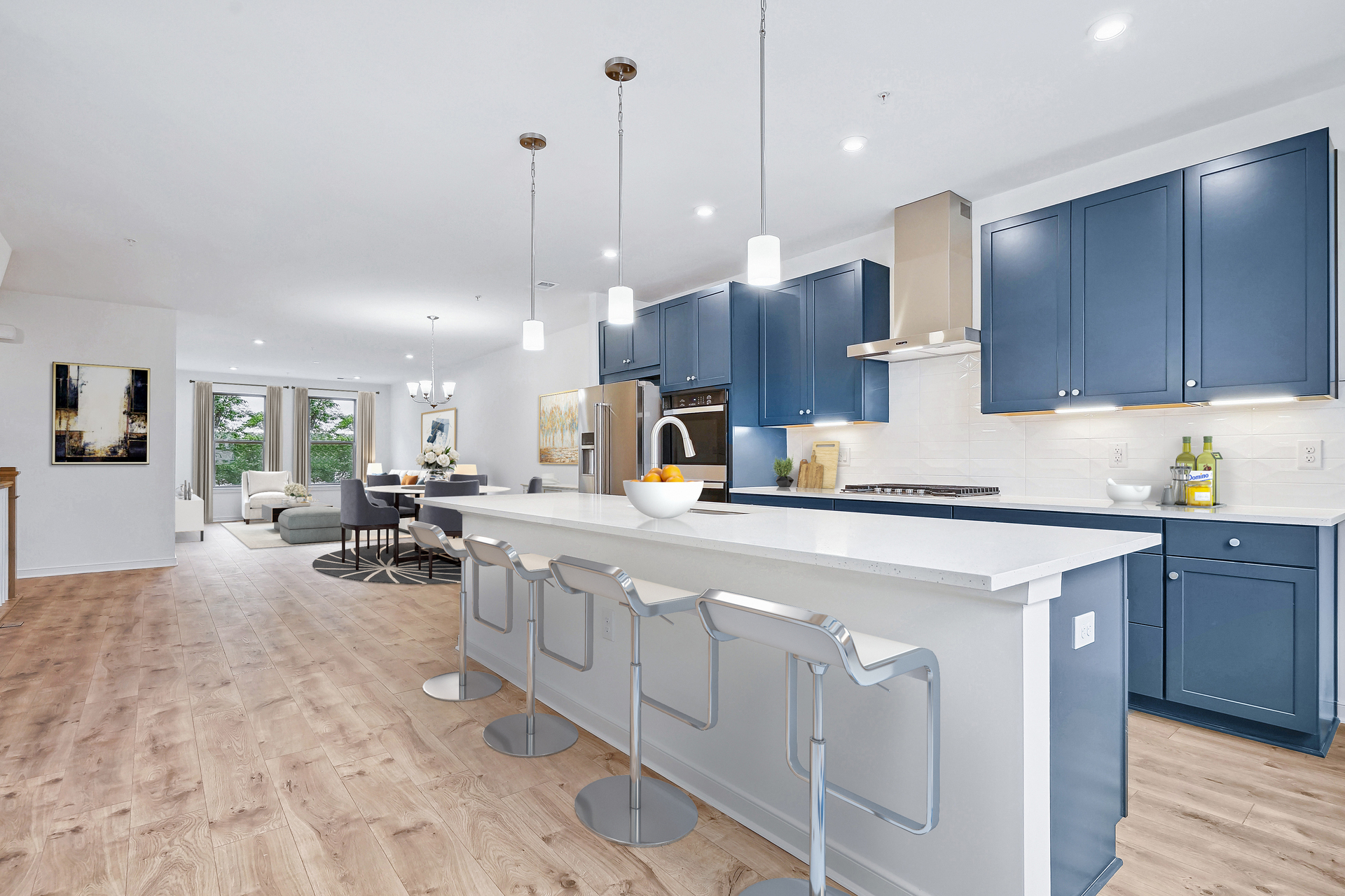 kitchen with quartz island and blue cabinets