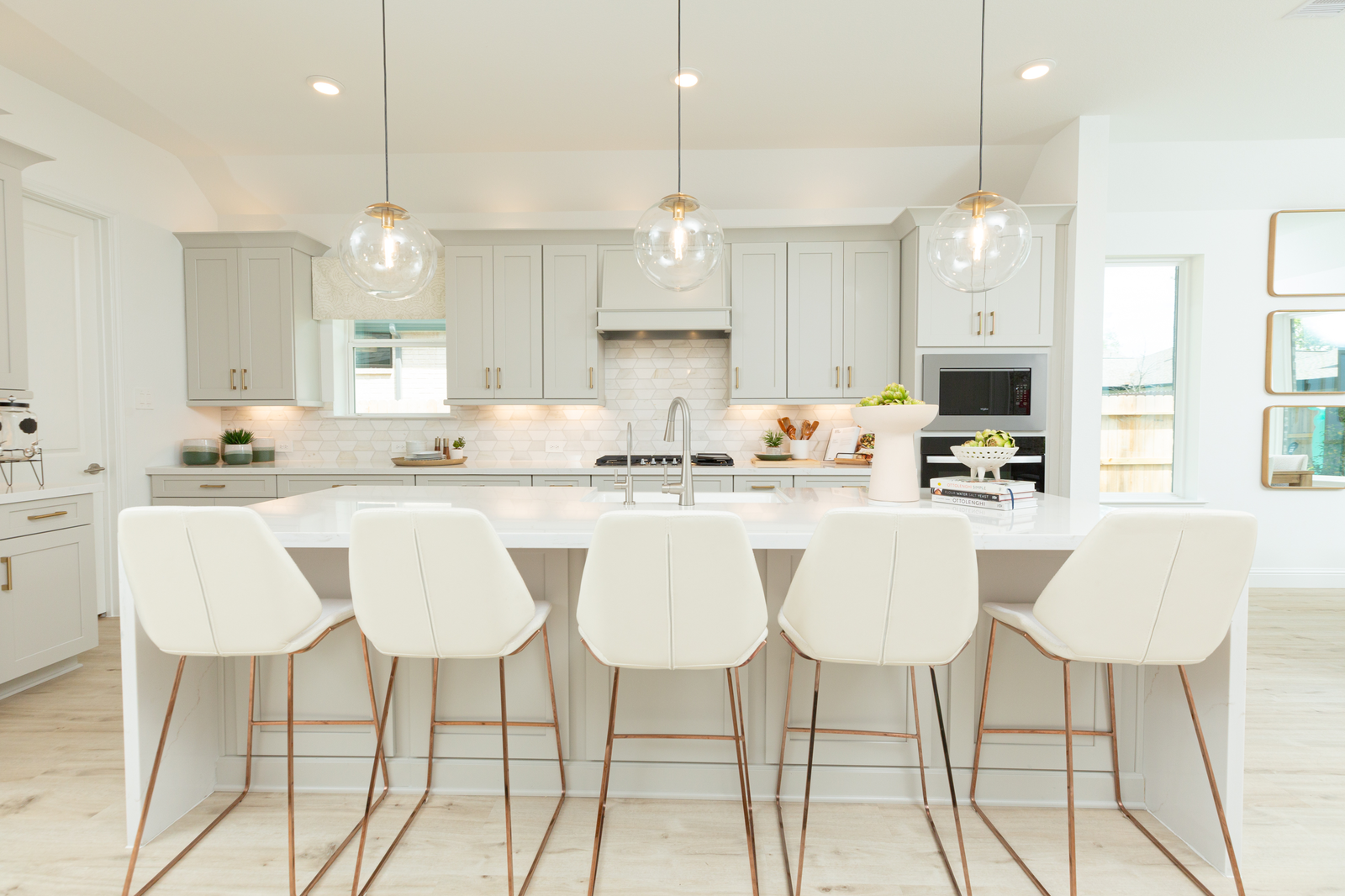 kitchen with large island and sink-adjacent window