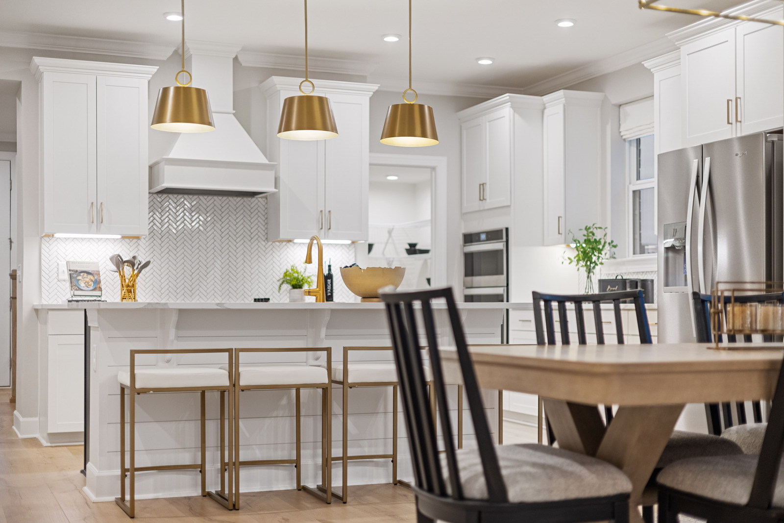 kitchen with large island and white cabinets 