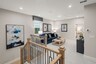 loft with carpet and oak tread staircase