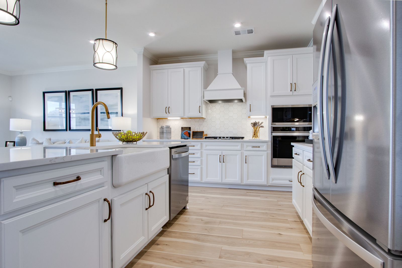 kitchen with white cabinets and gold hardware