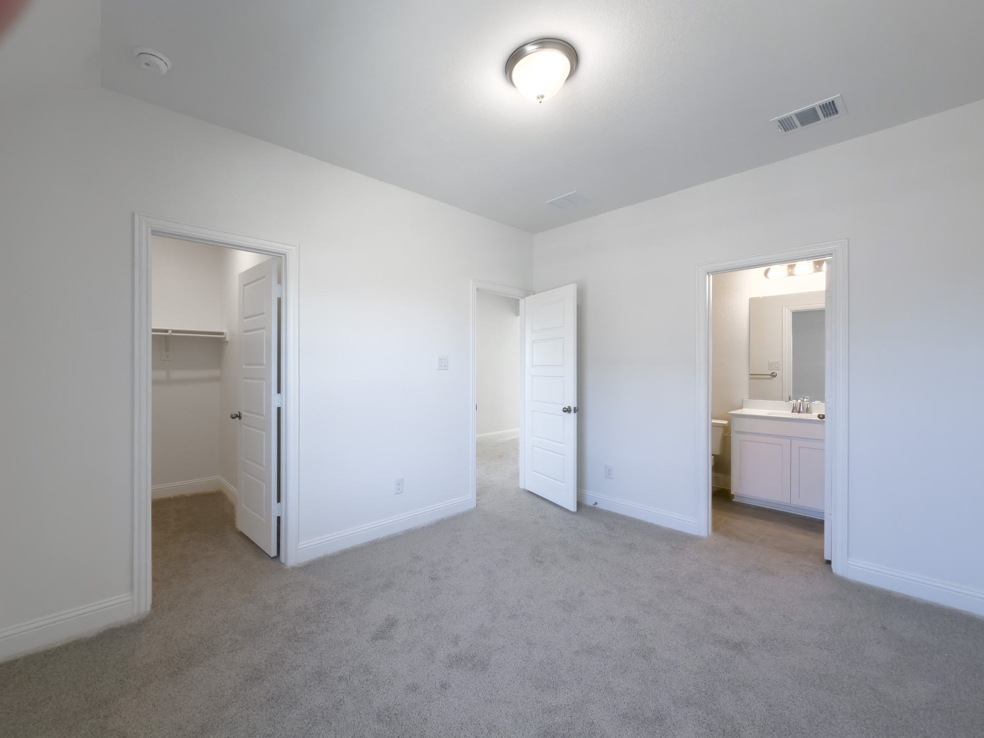 guest bedroom with carpet