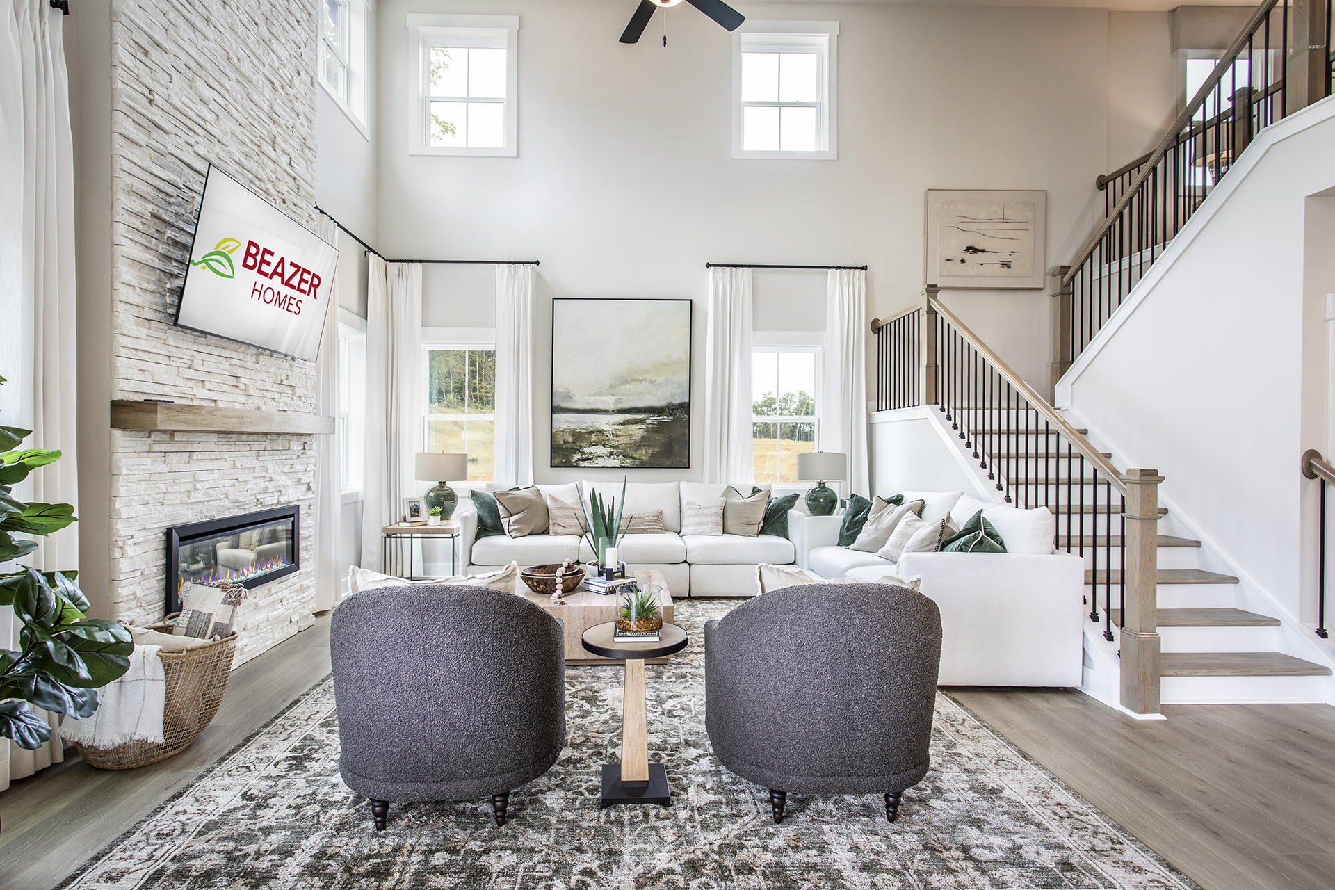 great room with 2-story ceilings and fireplace