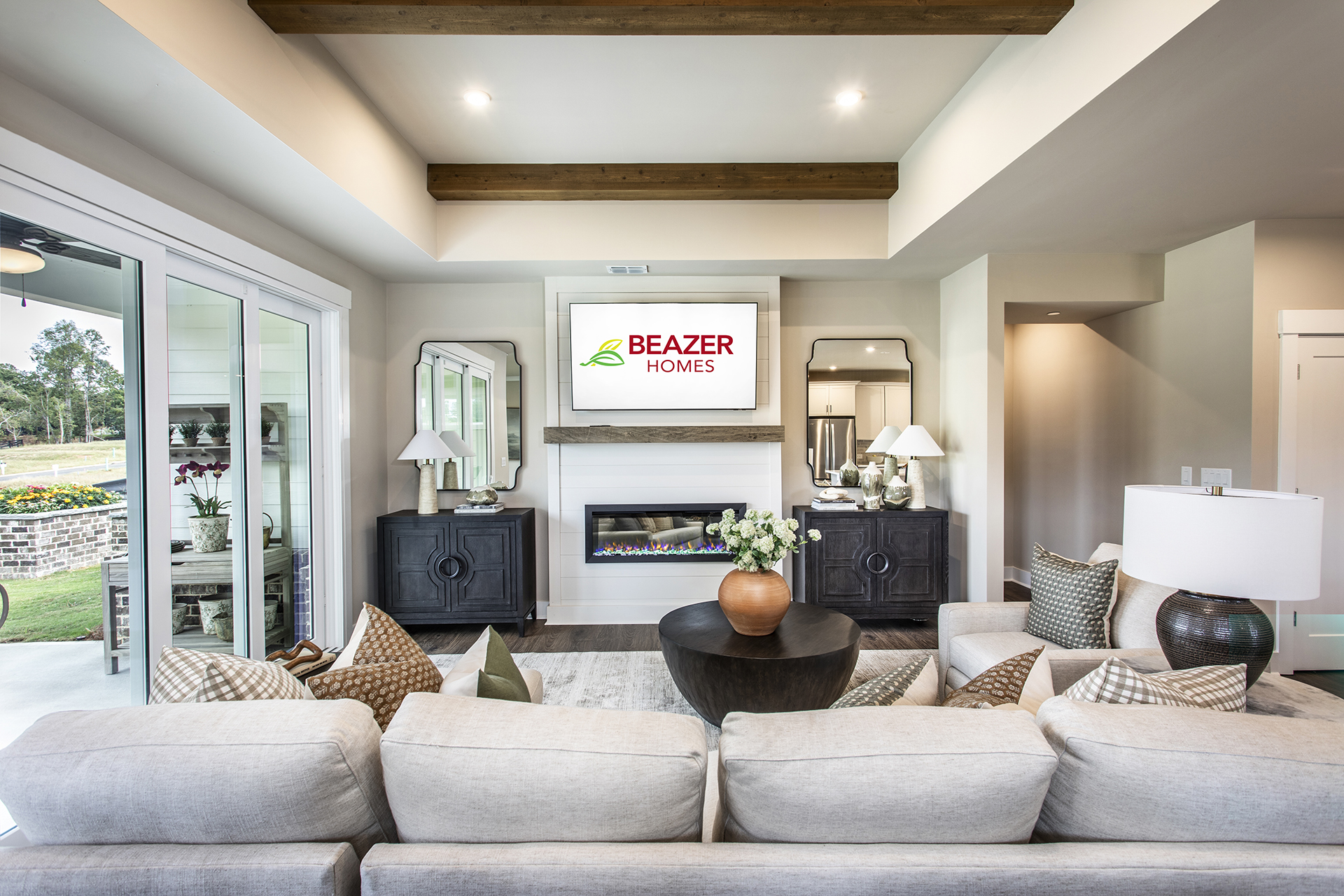 great room with electric fireplace and hard surface flooring