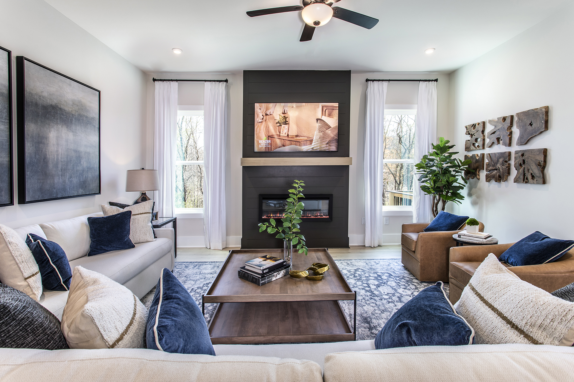 great room with electric fireplace and hard surface flooring