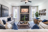 great room with electric fireplace and hard surface flooring