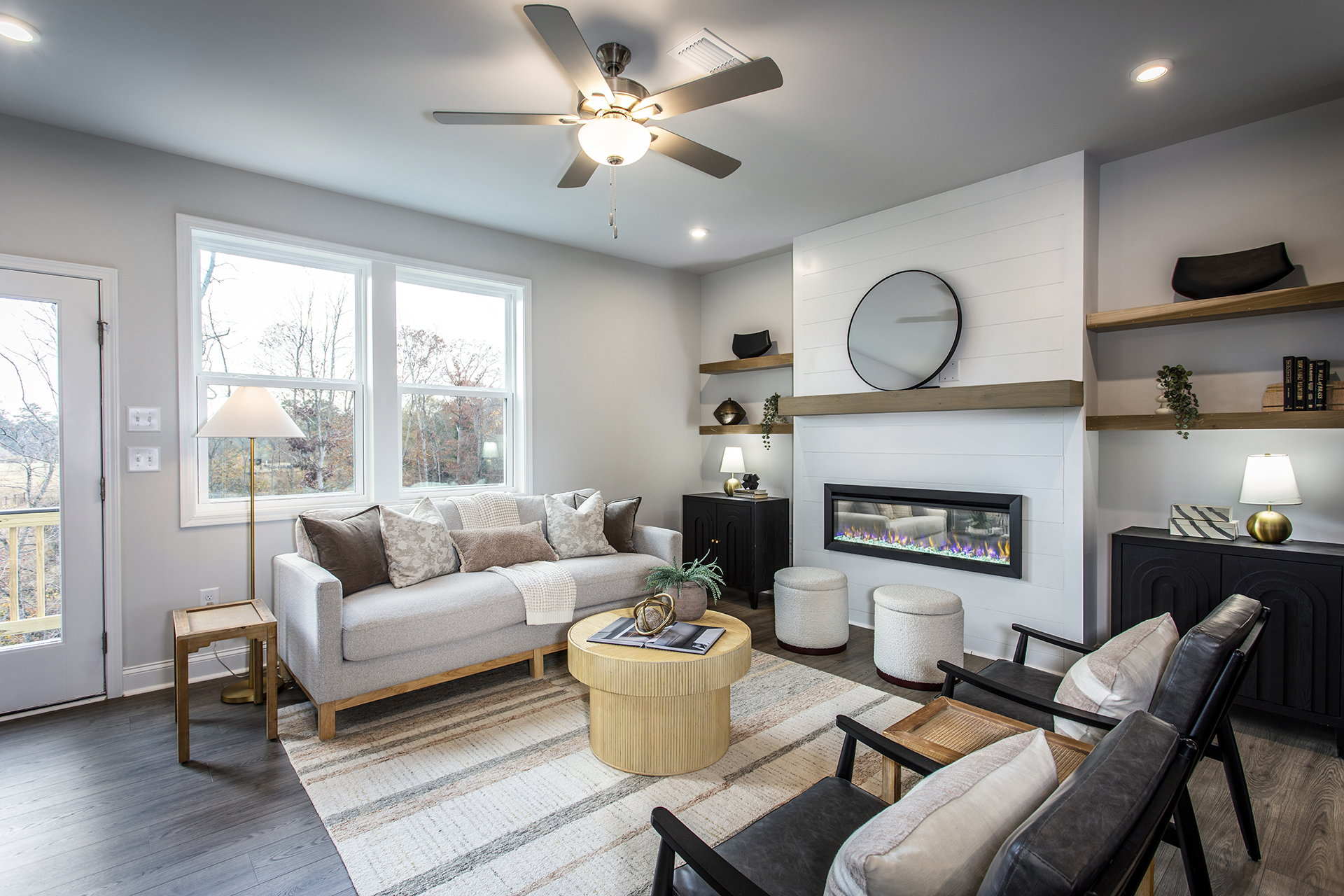 great room with electric fireplace and hard surface flooring