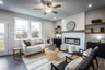 great room with electric fireplace and hard surface flooring