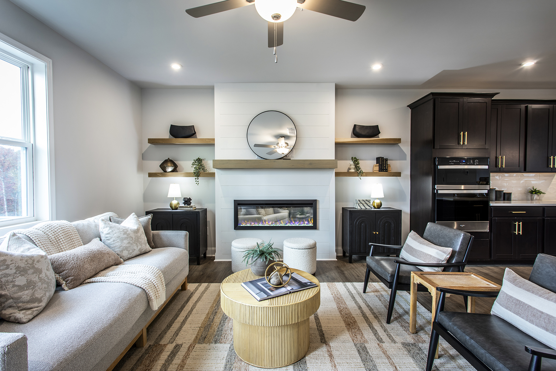 great room with electric fireplace and hard surface flooring