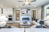 great room with electric fireplace and hard surface flooring