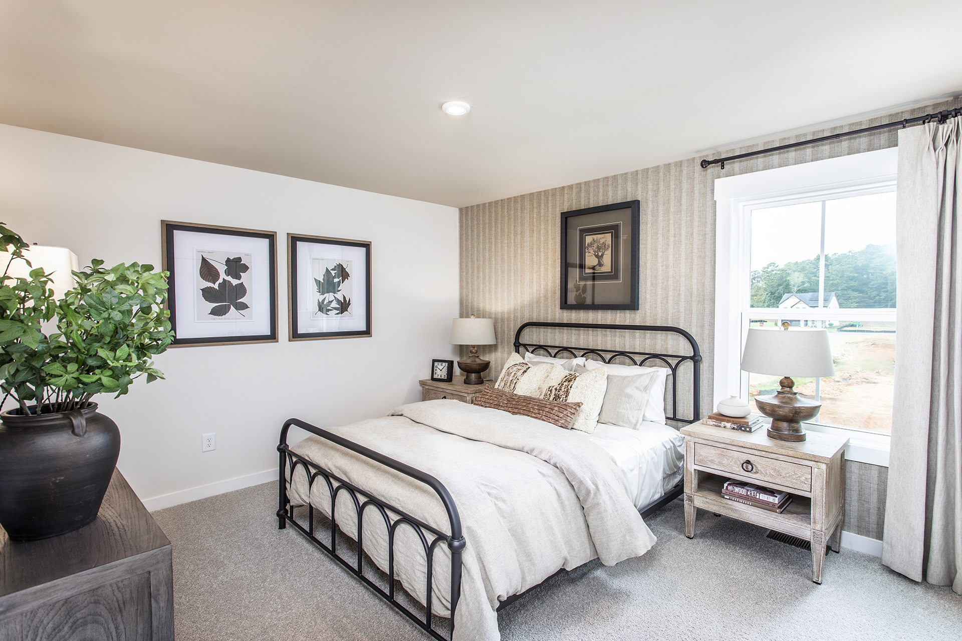 bedroom with windows and carpet