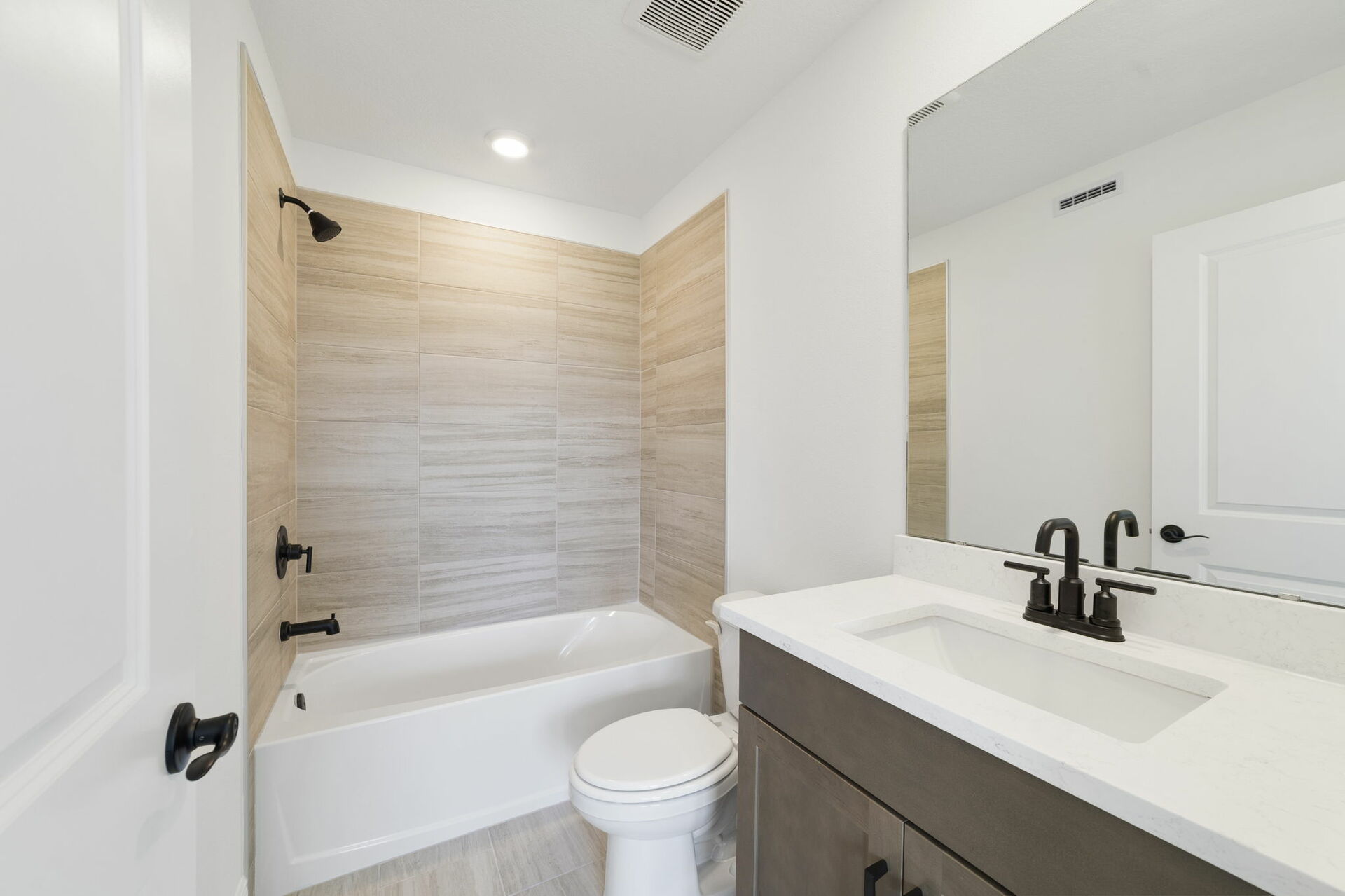 single sink vanity with tub and water closet