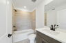 single sink vanity with tub and water closet