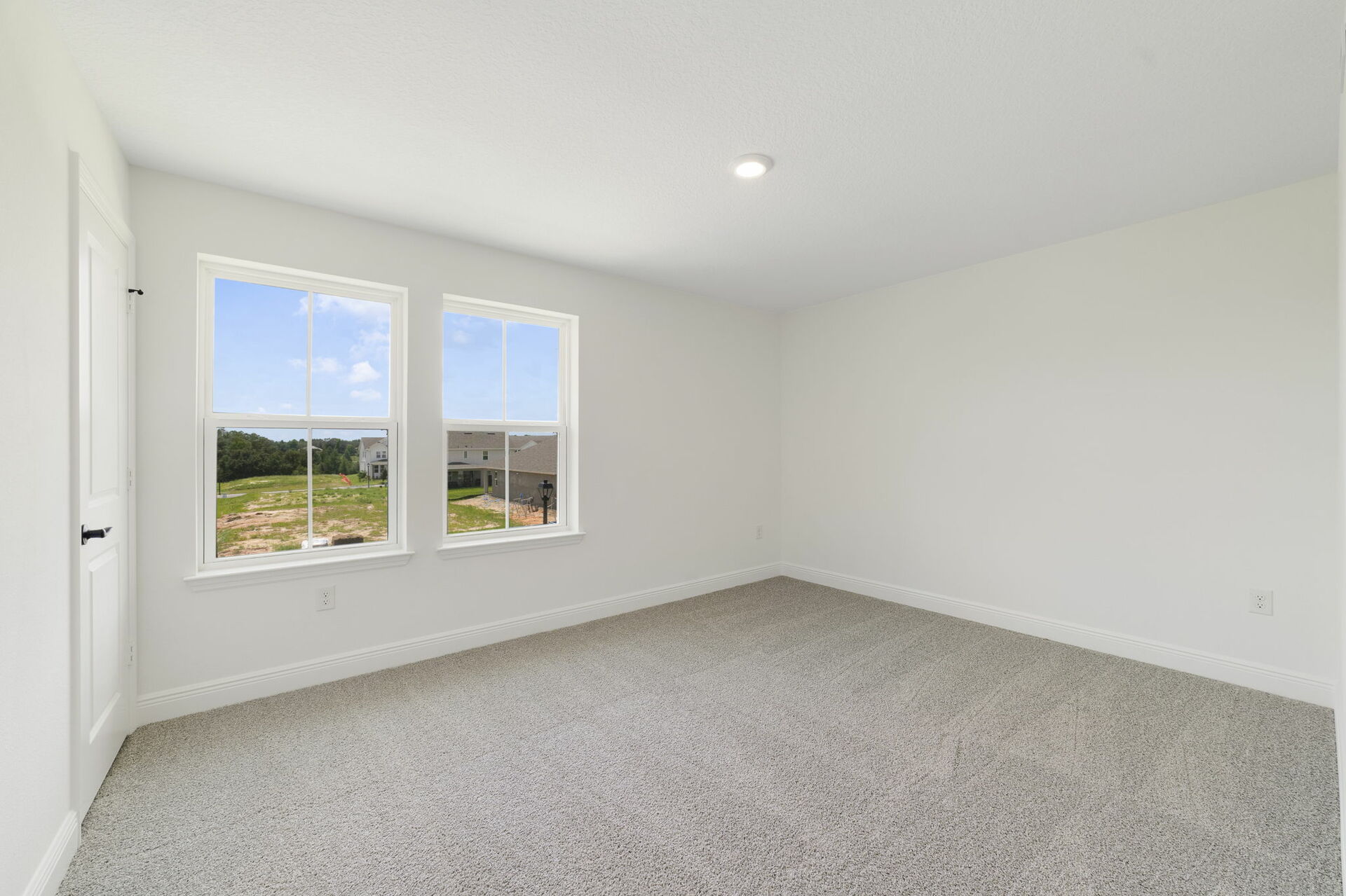 carpet throughout, multiple windows and access to the closet