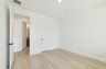nice flooring throughout with a window and access to the closet